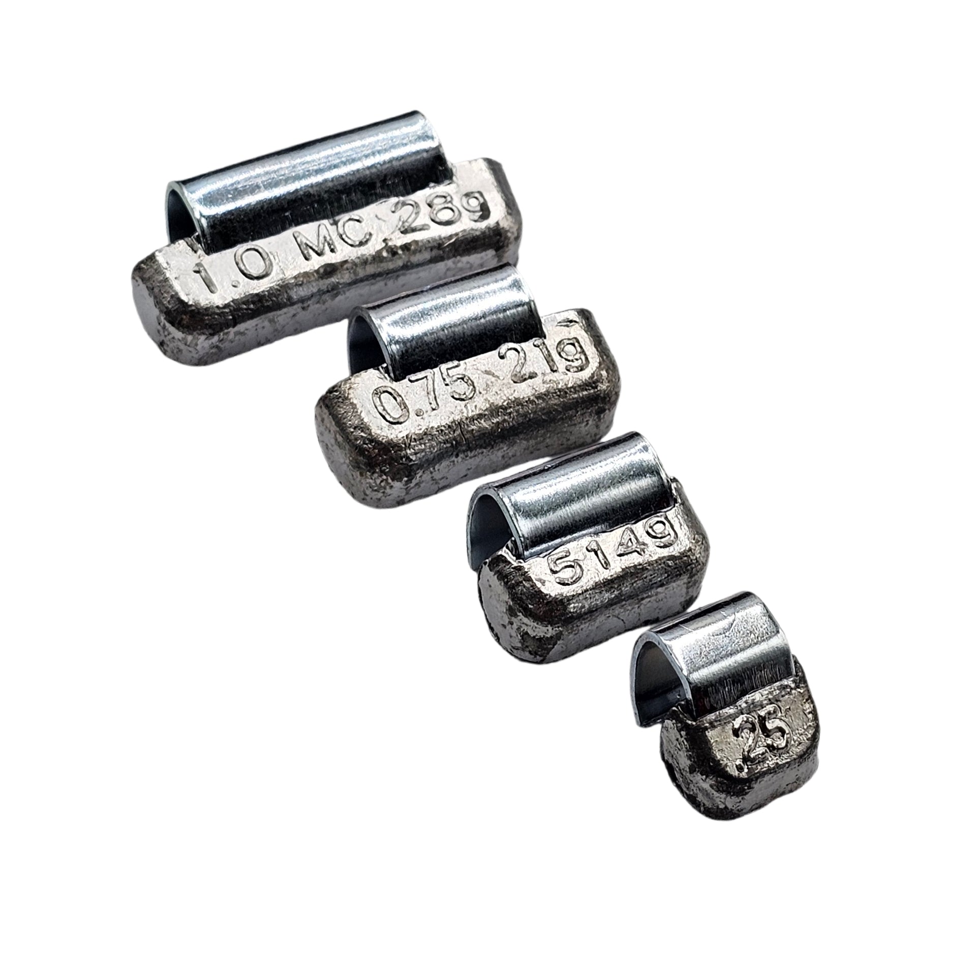 Set of four metal weights with engraved measurements on a white background