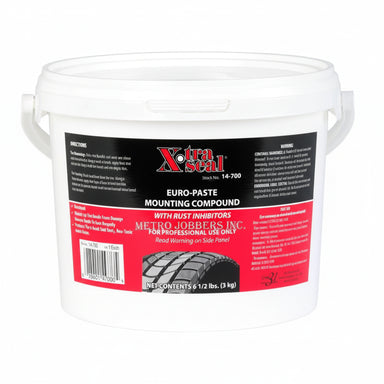 White bucket of Xtra Seal Euro-Paste Mounting Compound with a red and black label.