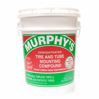 White bucket of Murphy's tire and tube mounting compound with a green and red label.