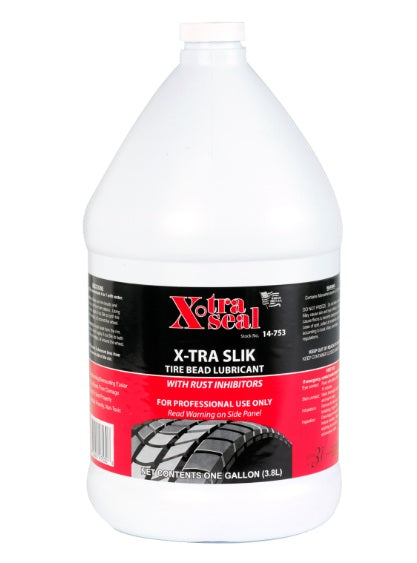 Gallon bottle of X-TRA Slick tire bead lubricant with X-TRA Seal branding on a white background.