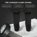 Tire changer clamp covers with a tire on a marble surface
