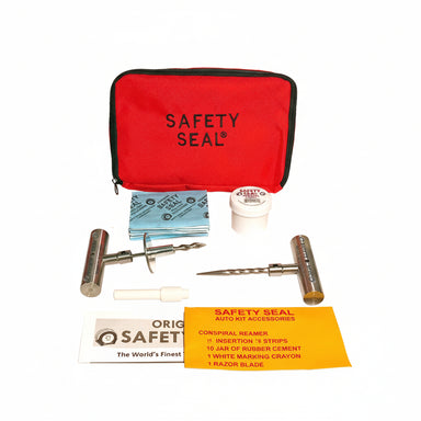 Safety Seal auto kit with red case, needle, cutting blades, wrench, and screw on a white background.